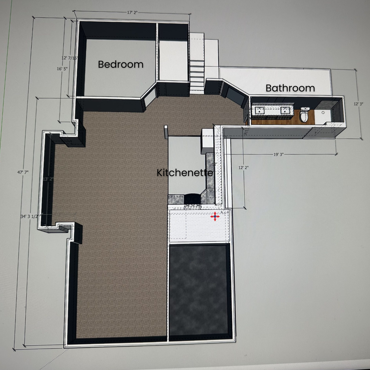 Finished basement with kitchenette, lounge seating, and door to guest suite for holiday hosting.